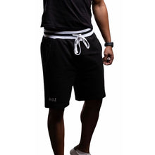 Load image into Gallery viewer, H.O.S. men&#39;s black jogger shorts are perfect for playing sports, lounging around, or overall looking stylish.
