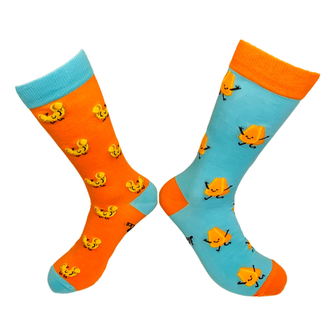 A fun pair of fun, novelty eclectic socks from house Of Shon resembling Mac N' Cheese! Features a macaroni on one sock, and a happy block of cheese on the other. Each sock also has a large cheese or macaroni design on the bottom!